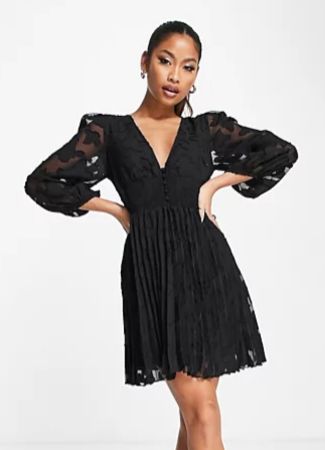 Black hen do mini dress with long sleeves and lace design