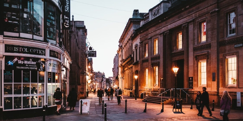 a lively street in Bristol at night