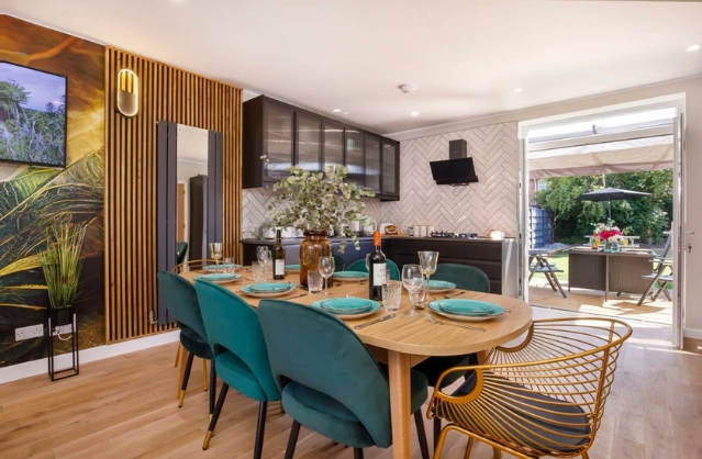 Stylish open-plan kitchen and dining area at Heworth House, a modern hen party property near York.