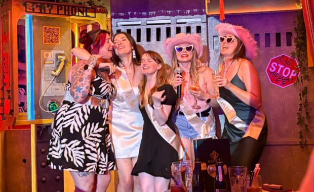 Hens enjoying a lively karaoke session, one of the most popular hen activities for 2025.