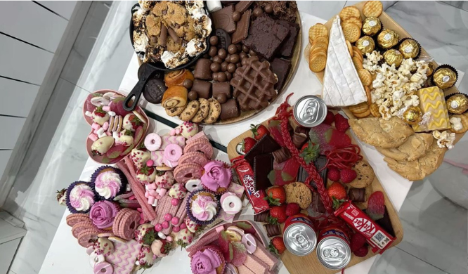 Galentine’s Day night-in ideas with a shared table of desserts, chocolates and sweet treats